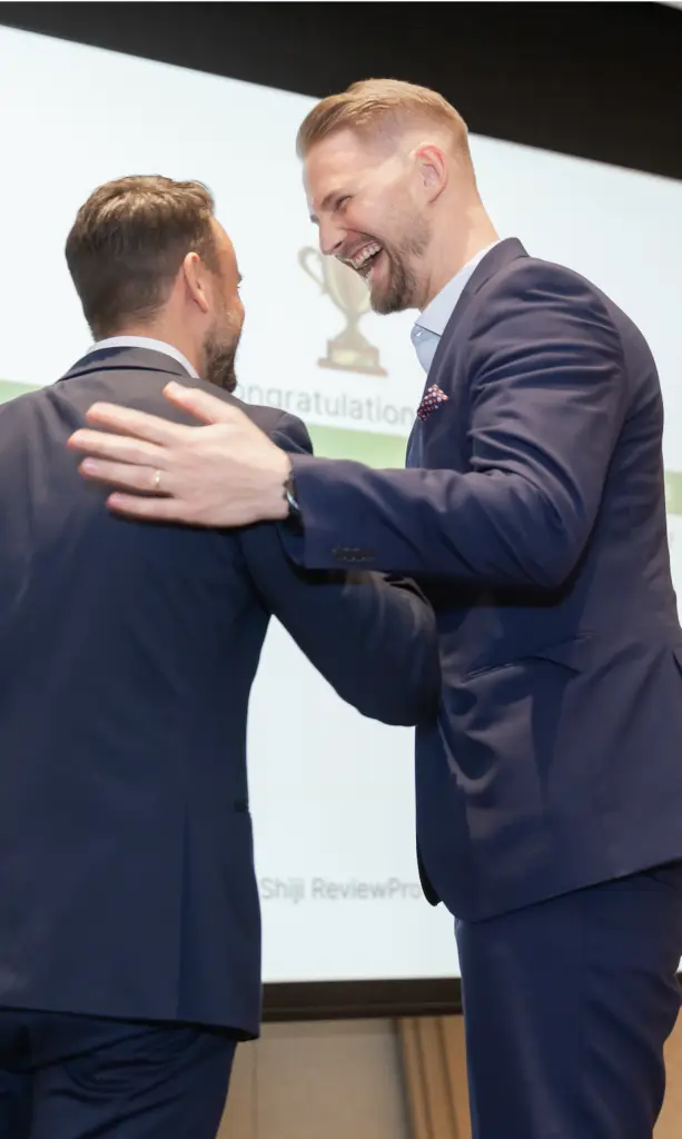 Florian Ultsch in talks with a partner at a tourism event in SEA